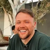 Close up of Matt Oliver in a shirt smiling